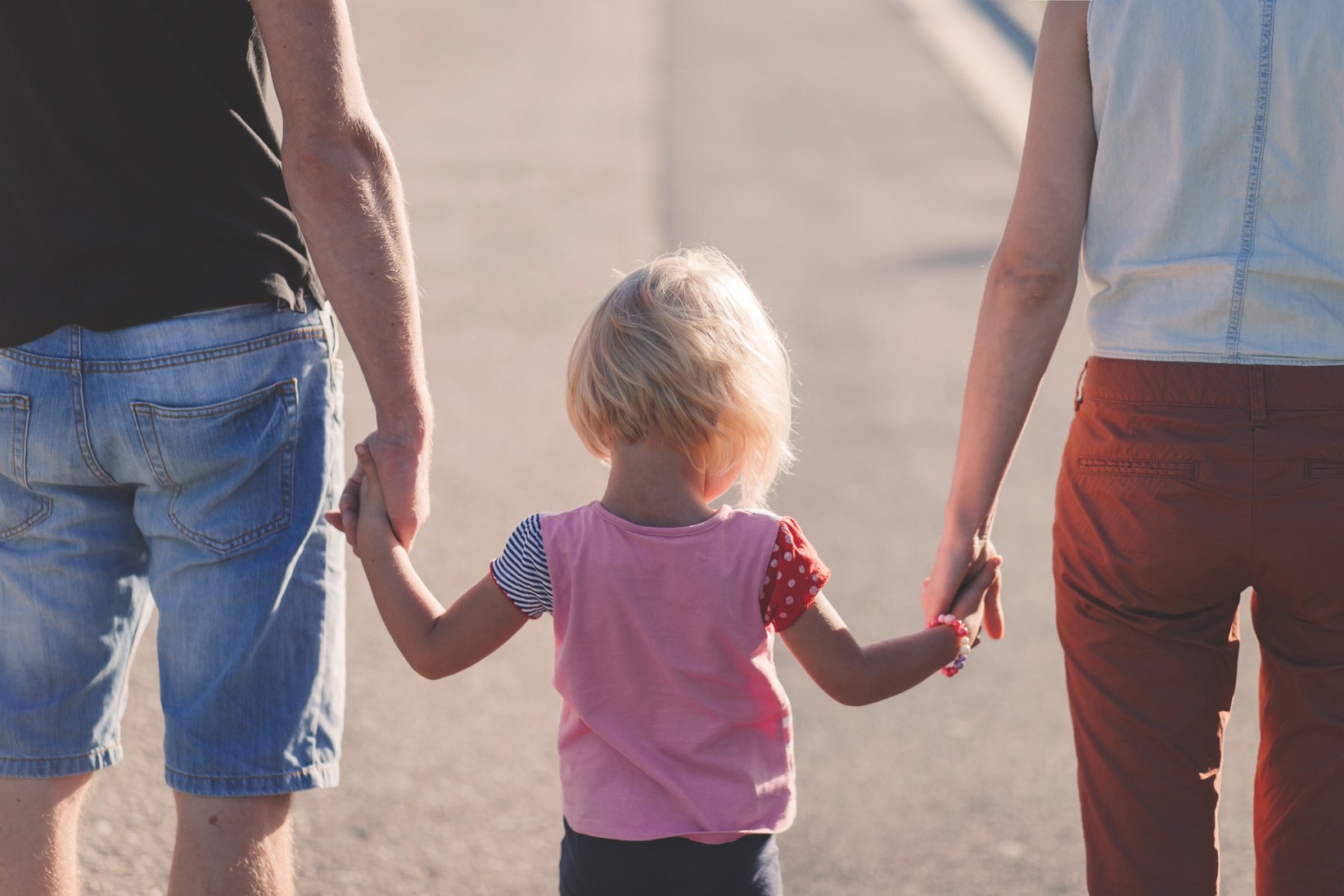 Kid Holding Adult's Hands